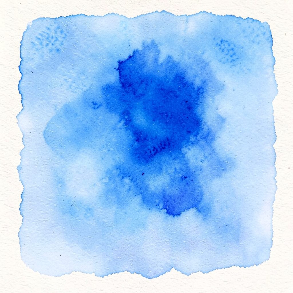 Icona d'adreça en blau d'or sobre fons blau pàl·lid